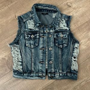 Distressed denim vest